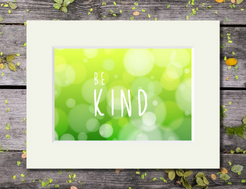 Abstract artwork with 'Be Kind' quote