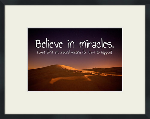 Sand dunes at night with 'Believe In Miracles (Just Don't Sit Around Waiting For Them To Happen)' quote