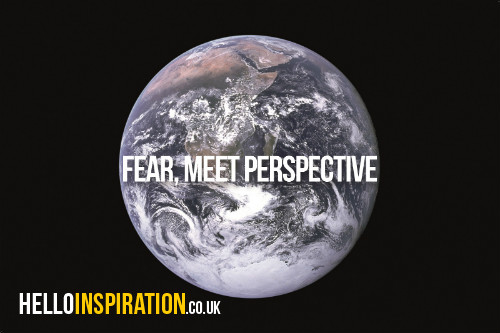 The Earth seen from space with 'Fear, Meet Perspective' quote